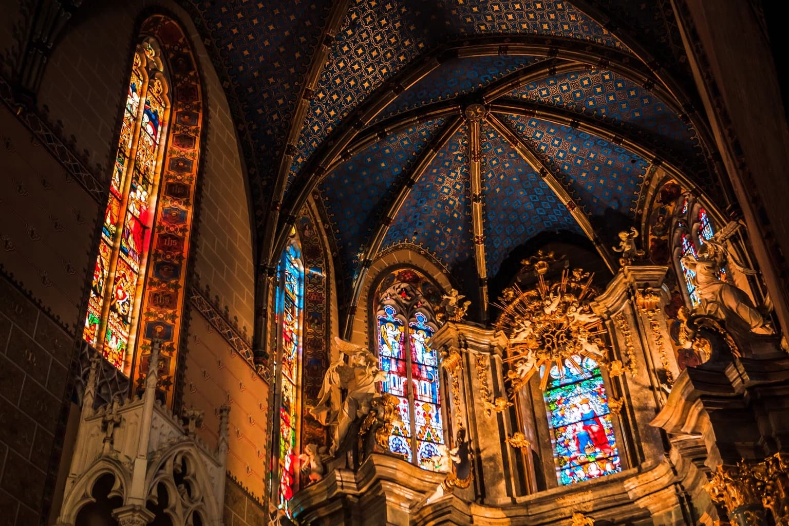 Stained-glass windows and the decorated cathedral ceiling